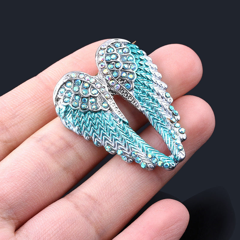 Angel wings brooch